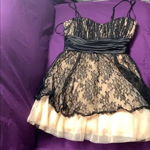 Black and cream lacy mini formal dress.